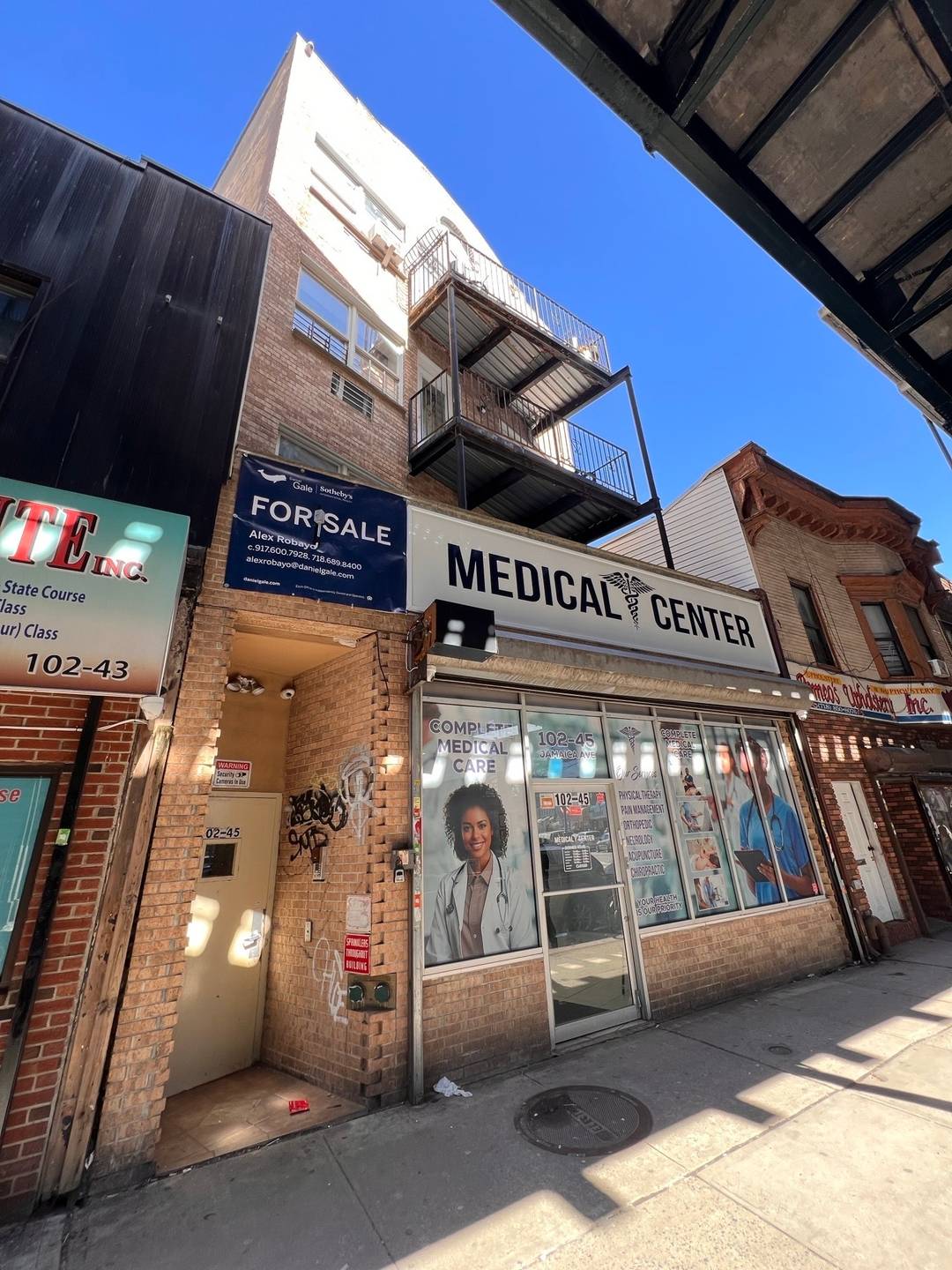 Multi unit mixed use building on a prime commercial Street Jamaica Avenue.