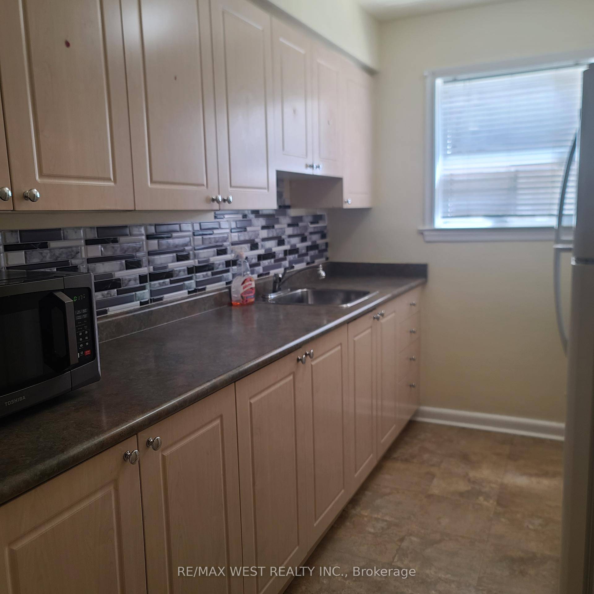 2 Bedroom Basement Apartment With Separate Entrance, 2 Tandem Outdoor Parking Spots for small vehicles, one spot only for larger cars, Close To Yorkdale, 401, Subway And Bus Stop.
