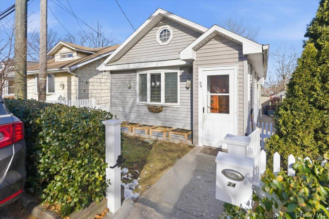 24 Poplar Avenue is a fully renovated 2 bedroom, 1 bath co op located within the gated Silver Beach Gardens community.