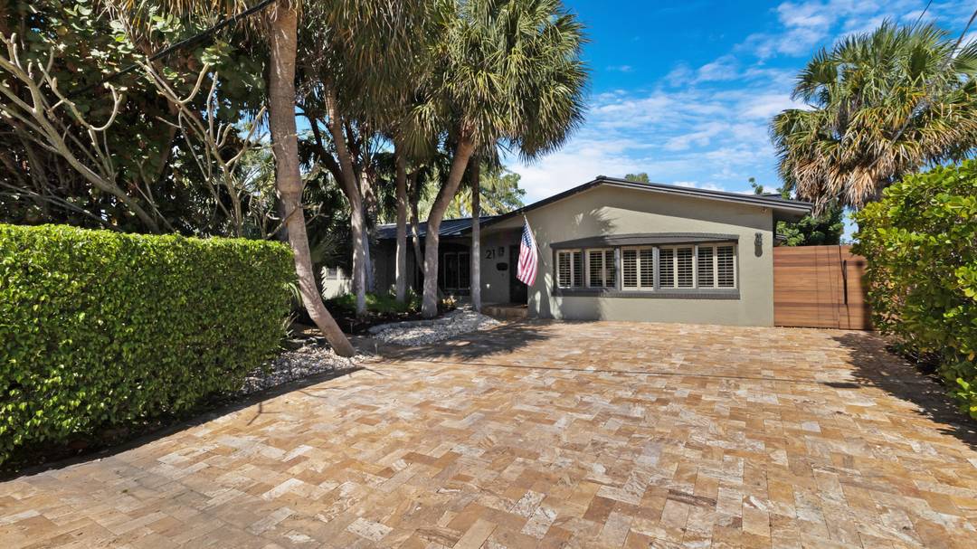 Welcome to this elegantly upgraded 3 bedroom, 2 full bath Waterfront retreat in Cypress Harbor, offering the perfect blend of privacy, modern comfort, and South Florida outdoor living.