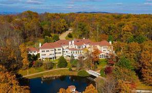 50 Poplar Hill Drive is a 50, 000 square feet masterpiece consisting of 19 bedrooms, 25 bathrooms, an indoor pool and hot tub, a night club, casino, an indoor racquetball ...