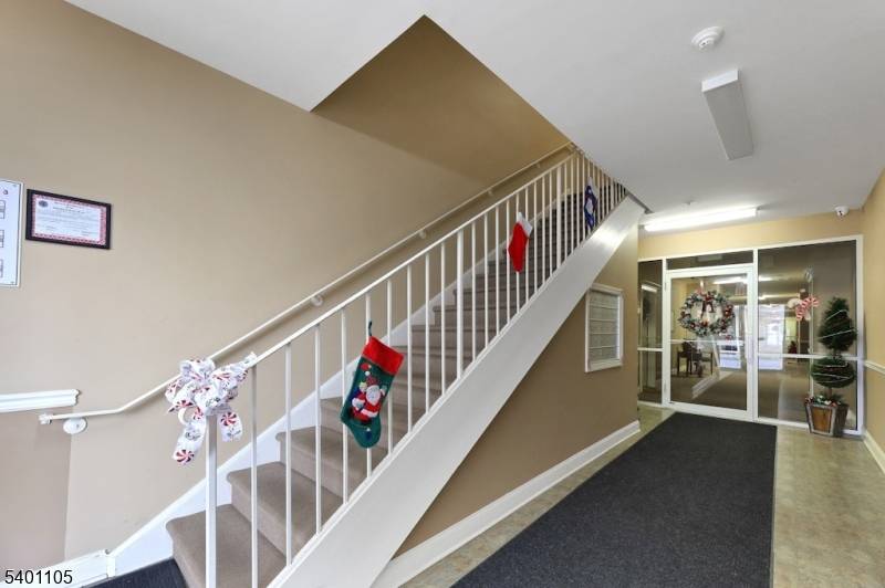 Comfort and convenience await in this desirable 55 development.