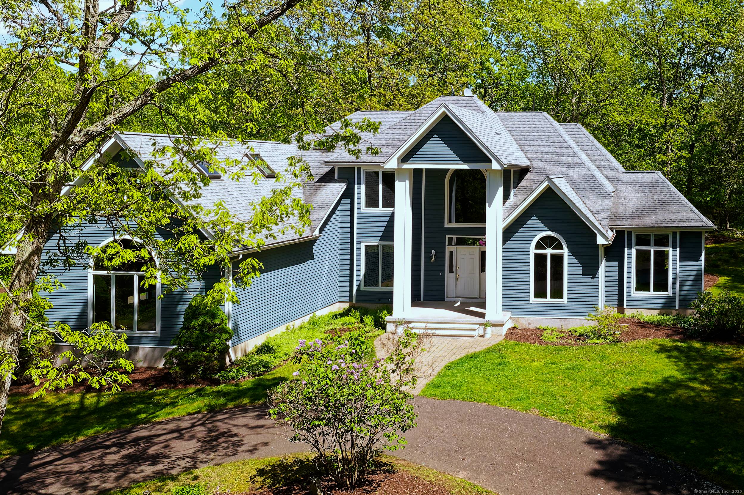 Set amidst the picturesque rolling hills of South Glastonbury, this impressive 3, 900 sq ft offers the perfect blend of luxury, space, and privacy on over 21 acres of land.