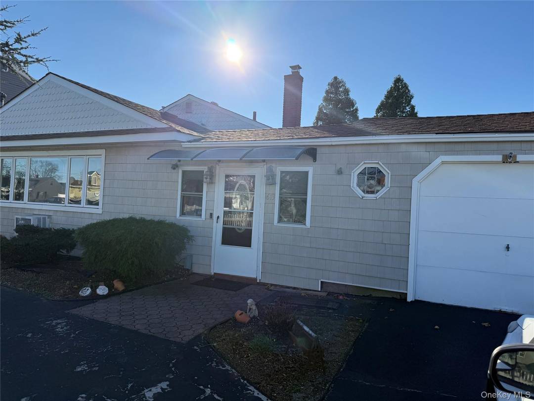 Welcome to 613 Madison Ave, Lindenhurst a beautifully maintained front to back split level home with modern updates and incredible space inside and out.