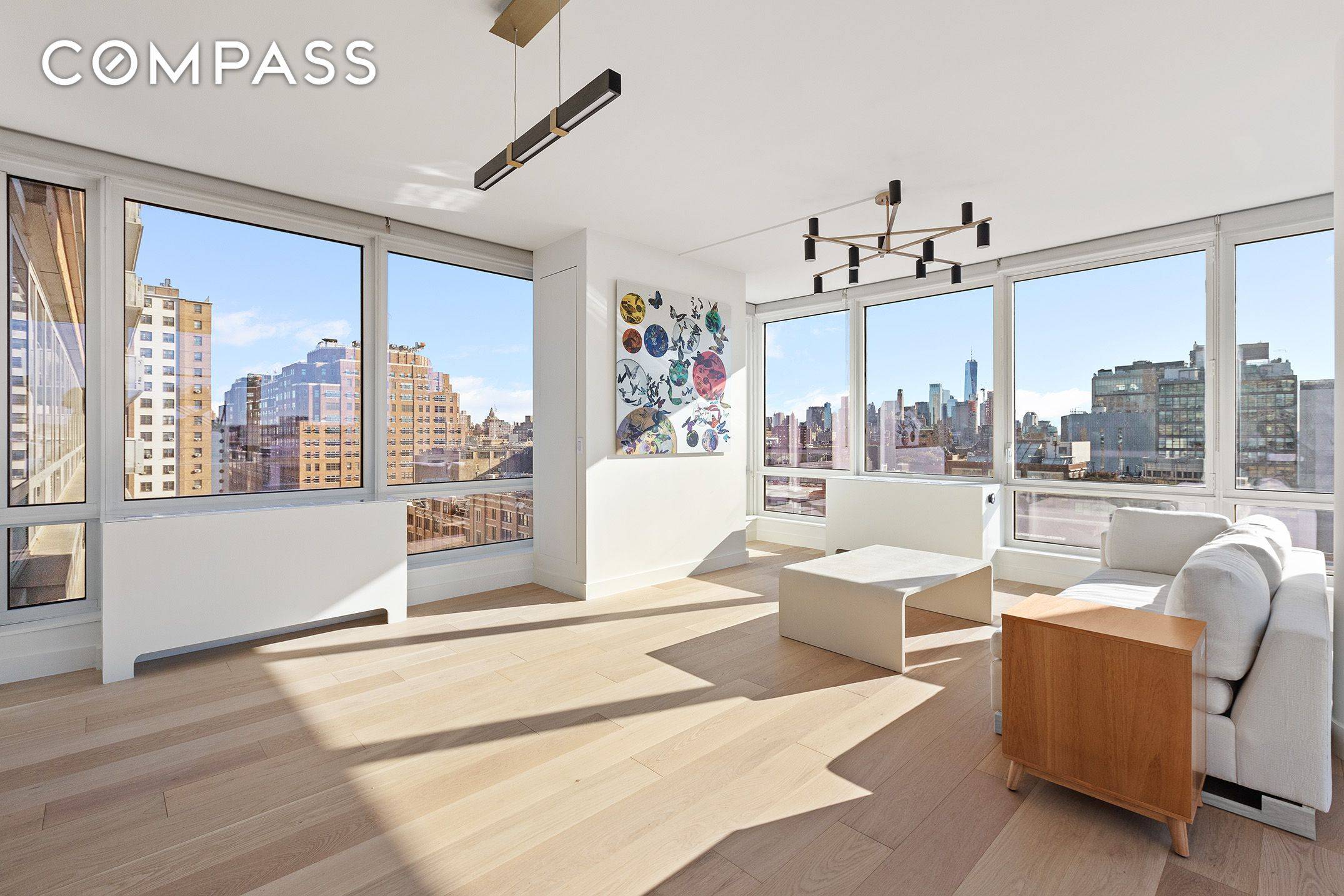 Perched high above the rooftops of West Chelsea, Residence 1709 at The Caledonia offers a rare blend of dramatic water views, radiant light, and impeccable modern design.