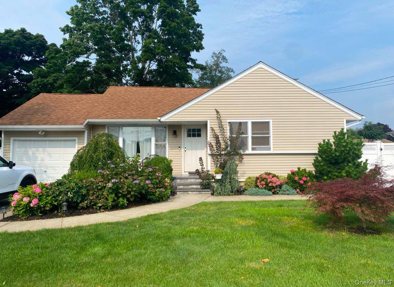 Completely renovated Ranch featuring New hard floors, Granite Counters, 3 bedrooms, 1 bath, family room, Full finished basement, private entrance, Utility room with washer and dryer.