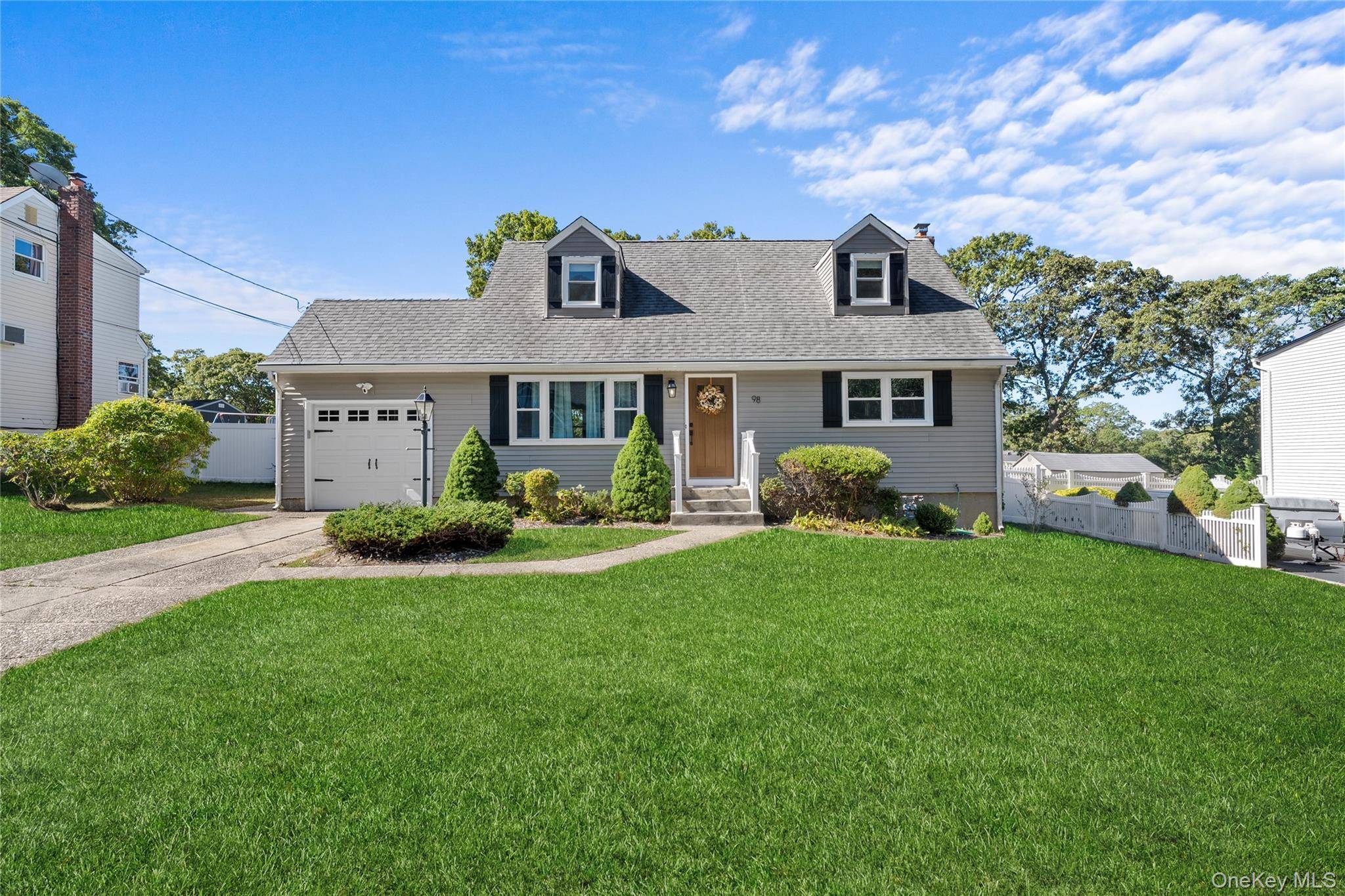 Welcome to 98 Paula Blvd, where timeless charm meets modern convenience.