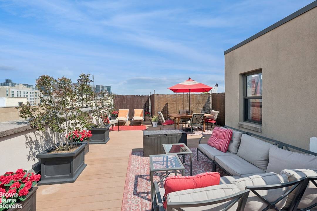 Two bedroom penthouse with a private two story roof deck in a Central Harlem condo.