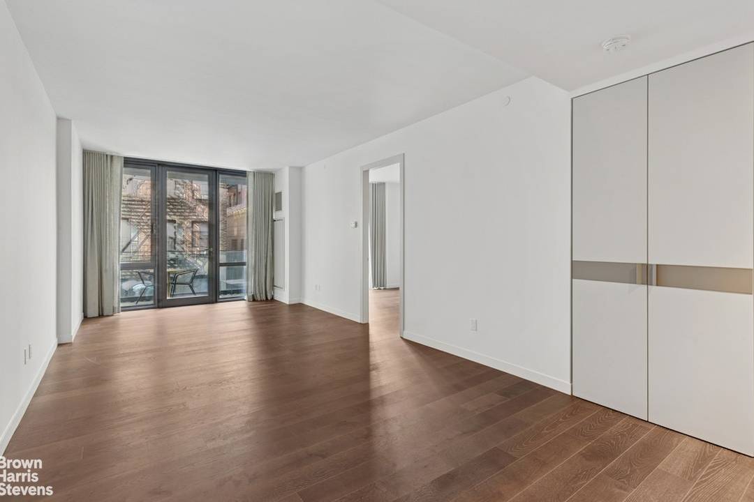 Incredible Condo Investment and Home High ceilings, southern and western light, tall windows and a balcony make this sensational space feel much larger than its square footage.