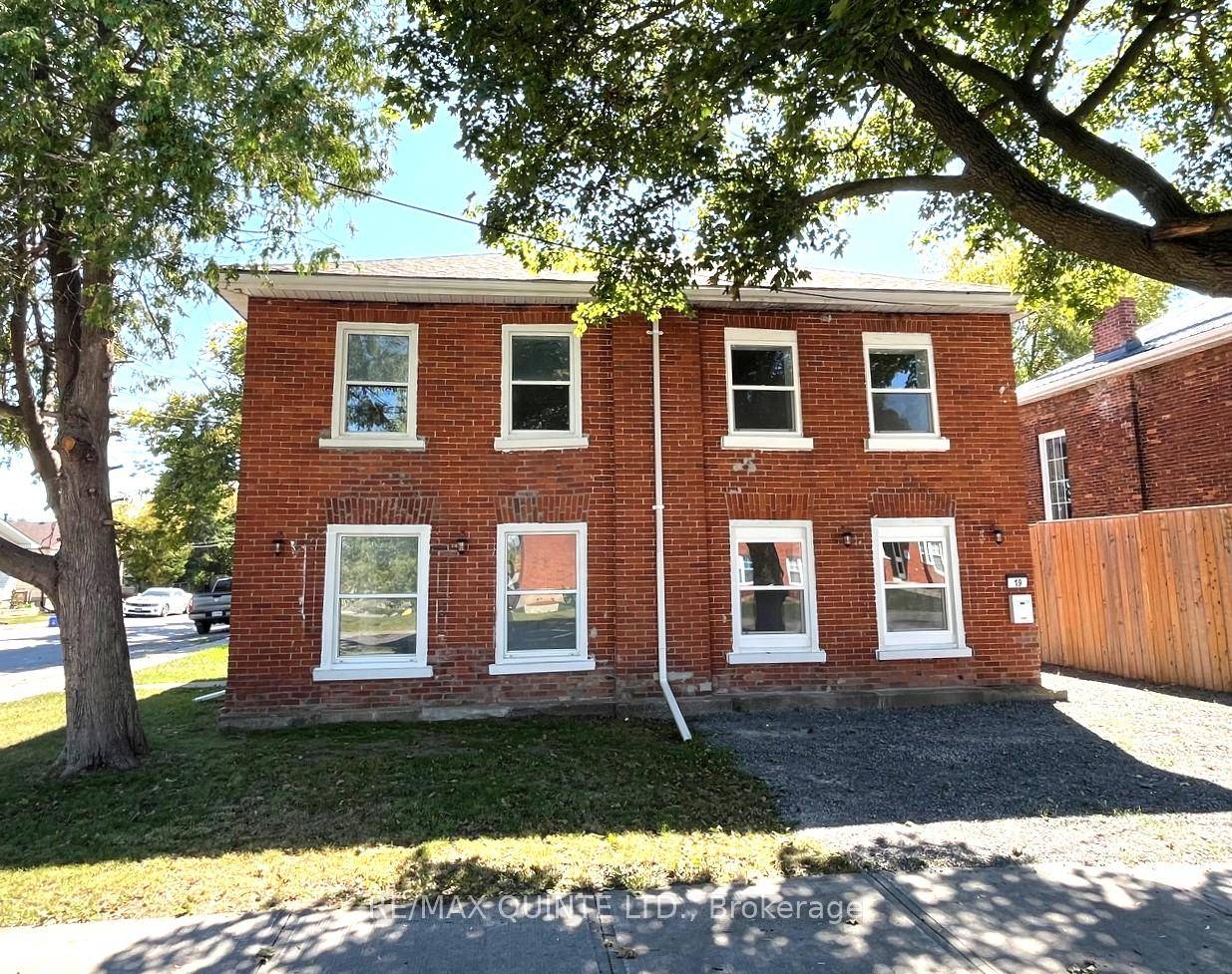 Impressive all brick duplex, fully renovated with two spacious side by side units.
