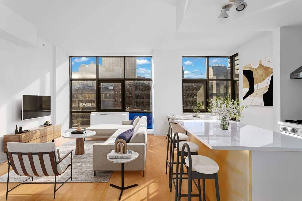 Apartment 4A at The BLUE Condominium in the Lower East Side is an over sized one bedroom home flanked with gorgeous, west facing, floor to ceiling windows.