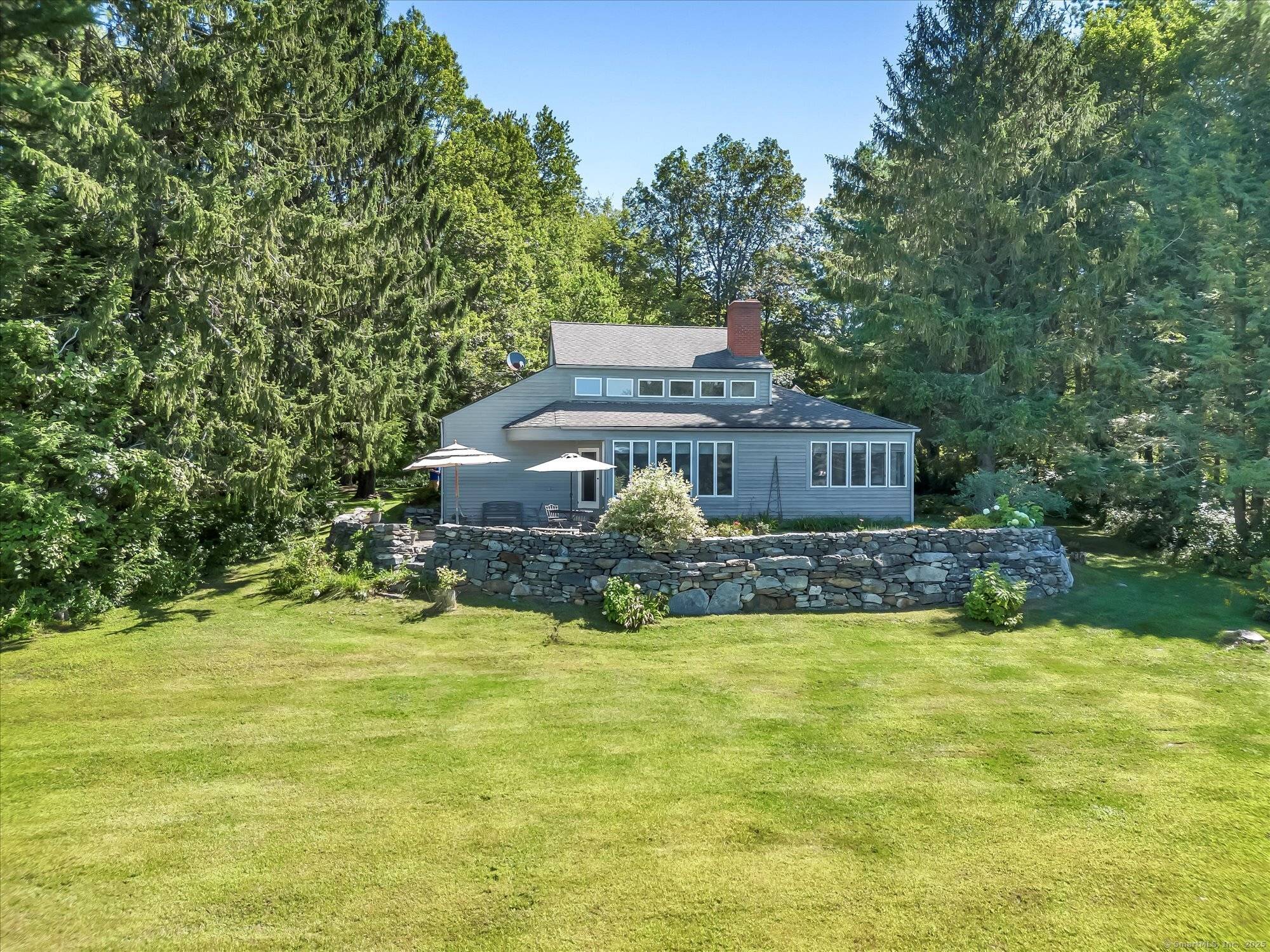 Dream retreat in South Kent on nearly 25 high acres with potential to create views of rolling hills to the west.