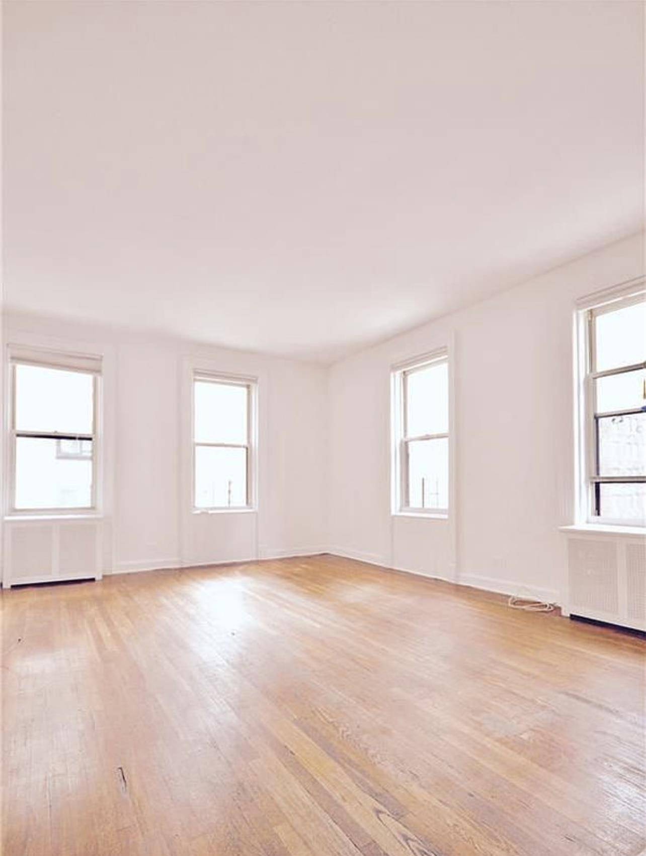 Just around the bend from Central Park, this rarely available corner unit features two bedrooms, one and a half baths, and partial Central Park views.