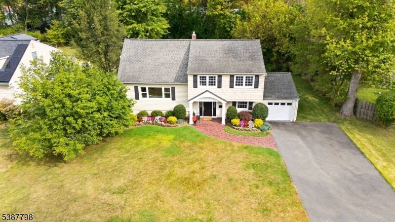 Wow ! 54 Badgley will impress you from the moment you pull up to this meticulous home !
