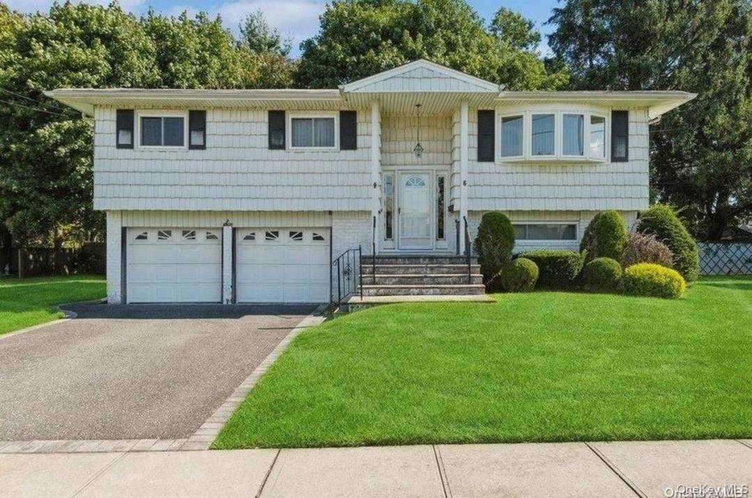 Welcome to this newly renovated first floor apartment with an oversized open concept living room, dining area, and brand new kitchen with new stainless steel appliances refrigerator, electric stove and ...