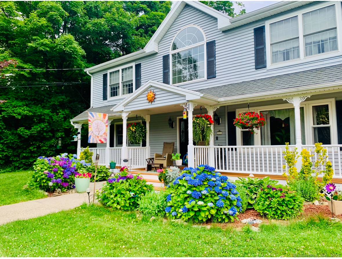 Welcome to 269 Silver Hill Road walk into a big open foyer with gleaming hardwood floors.