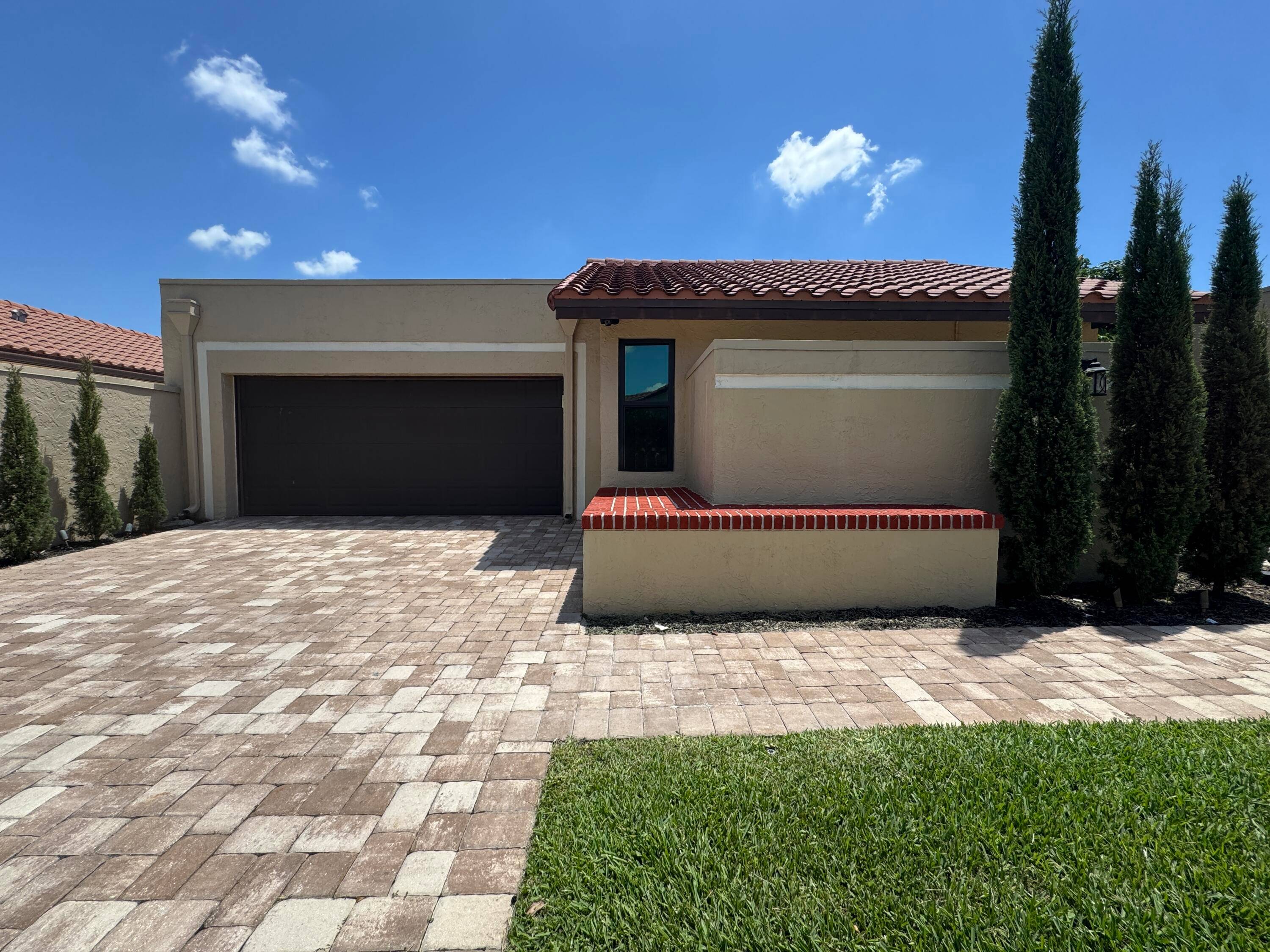 Beautifully updated 3BR 2BA pool home with den in desirable Boca Raton neighborhood.