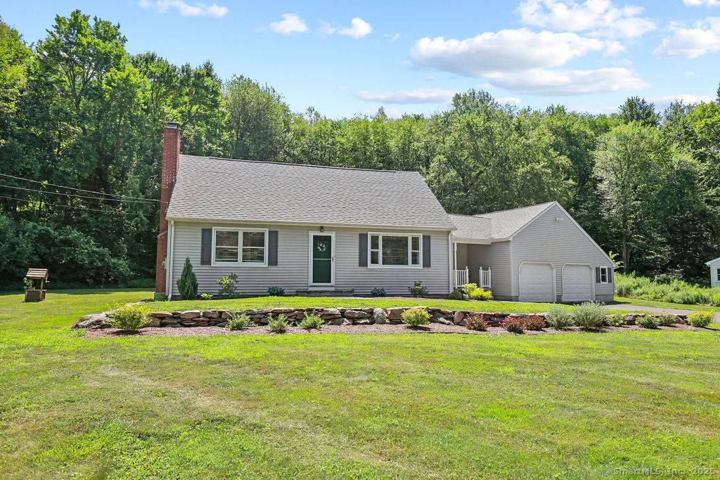 Beautifully remodeled 4 bedroom 2 bath Cape in a perfect setting.