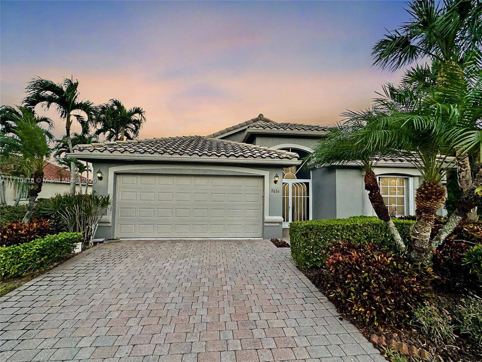 Beautifully maintained 3 bedroom 2 bathroom home, on a large lot overlooking a beautiful lake, in the highly sought after 55 gated community of Ponte Vecchio West.
