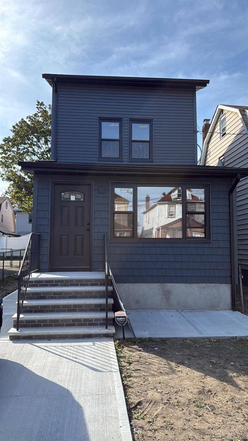 Beautiful, fully renovated home featuring four spacious bedrooms, including a master bedroom with a full bathroom on the first floor.