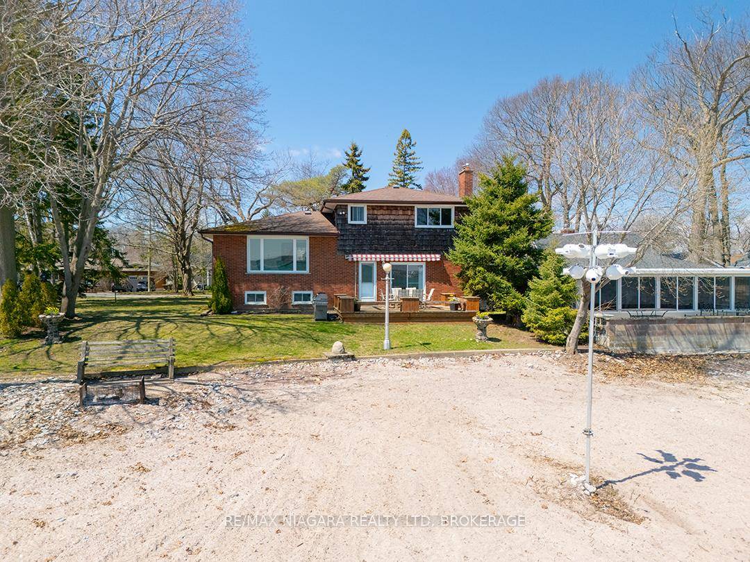 Situated directly on Gravelly Bay, this waterfront property offers lovely views of Lake Erie, the Port Colborne lighthouse, Sugarloaf marina, and the entrance to the Welland Canal.