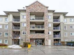 Beautiful, Spacious, Bright With Gleaming Laminate Floors Throughout on Main Floor ; Shows 10 Upgraded Luxury Condo.