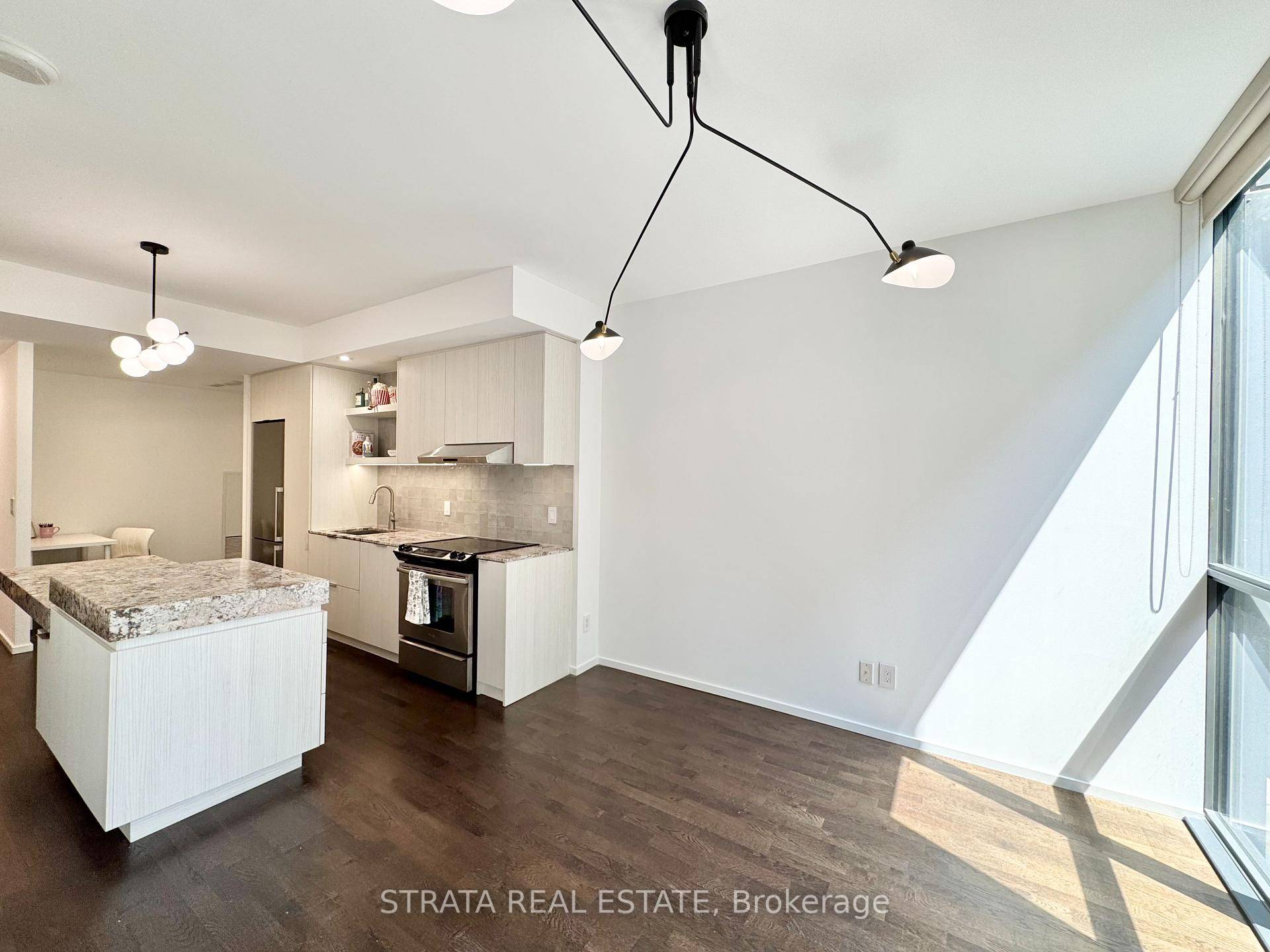 Welcome home to this spacious, bright and functional South facing 1 1 unit with 9.
