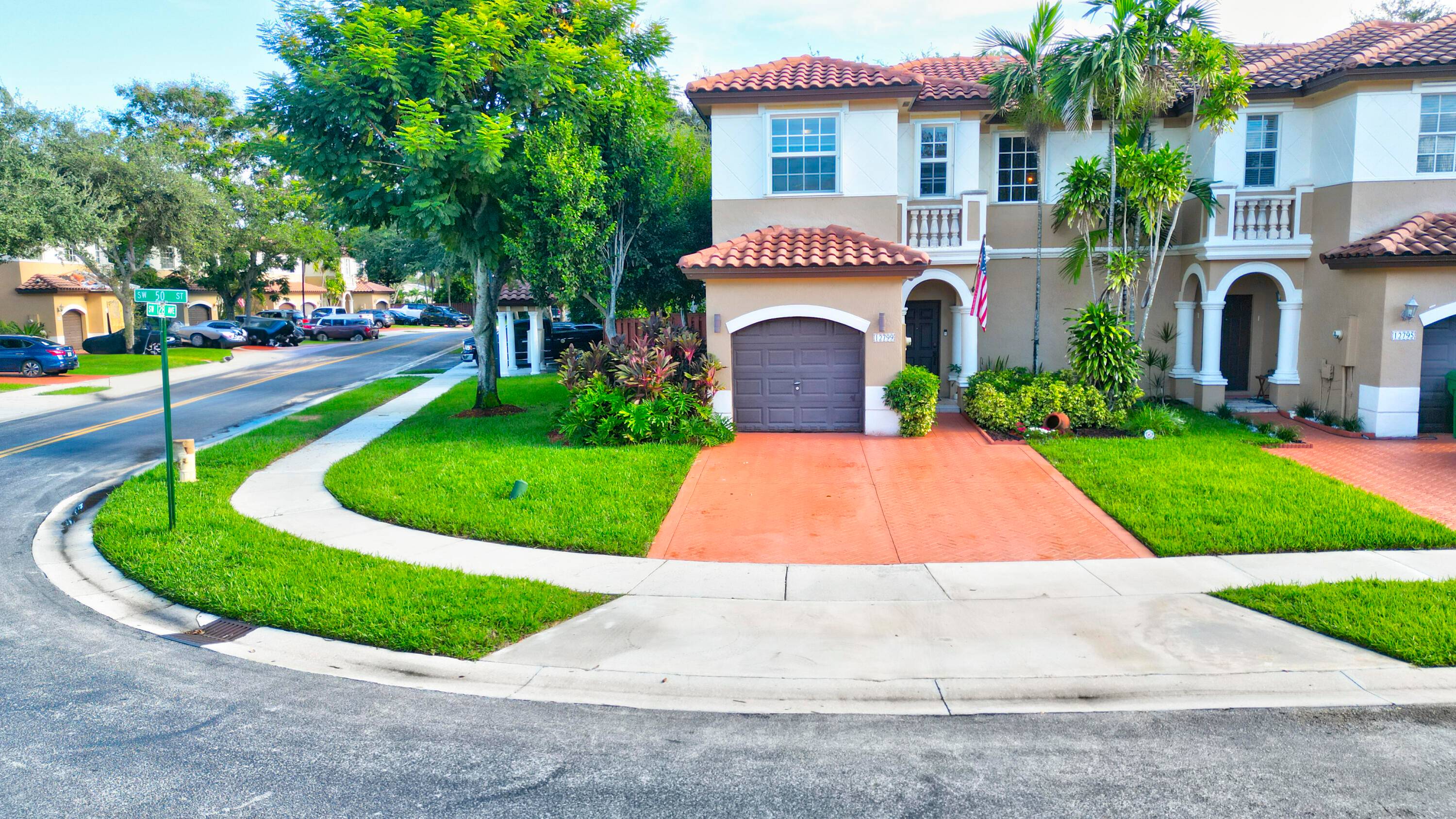 Beautiful corner lot home featuring soaring ceilings, tray ceiling dining, and master suite with garden tub.