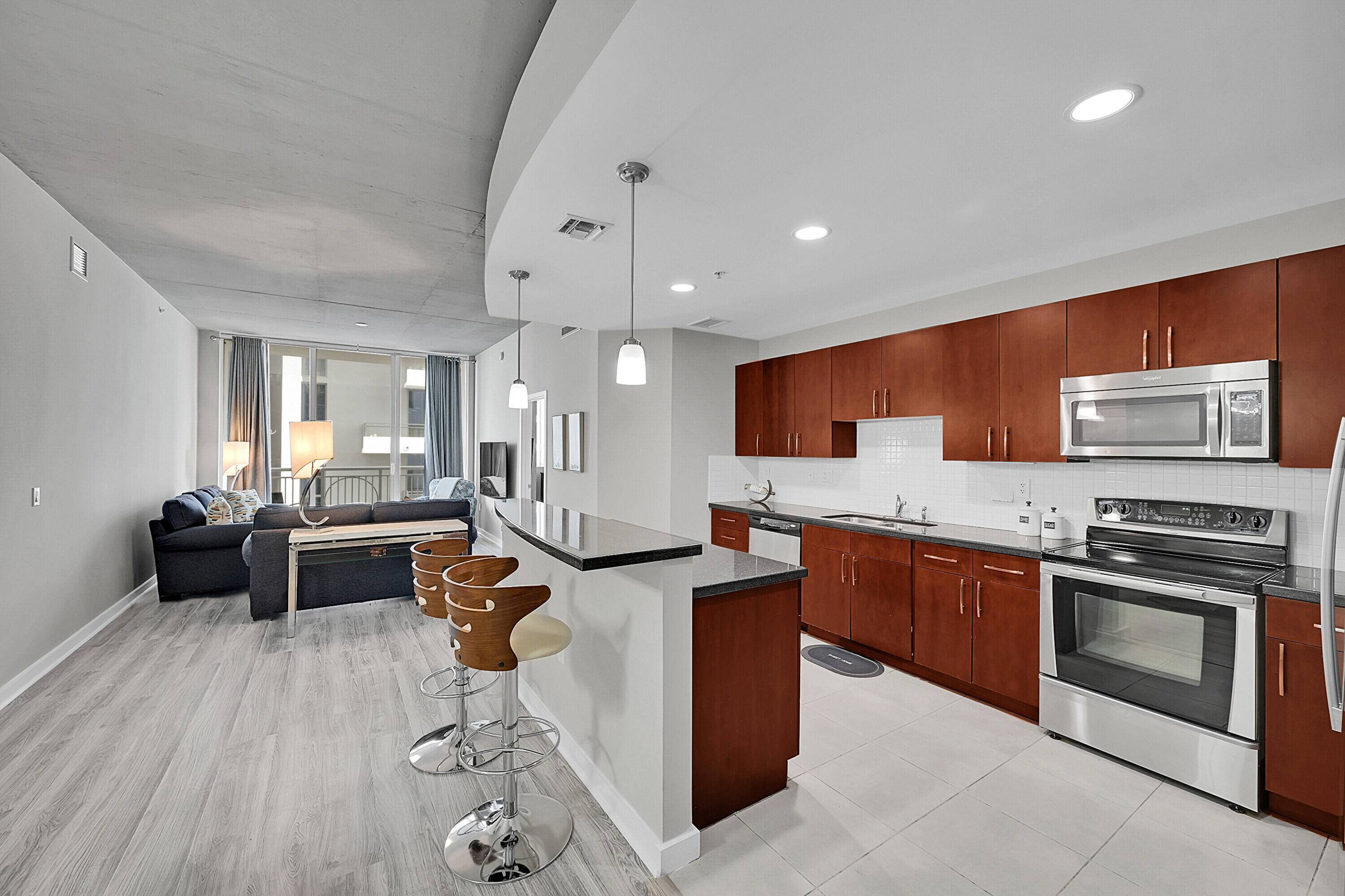 Escape to this exquisitely furnished, modern condo in Downtown West Palm Beach.