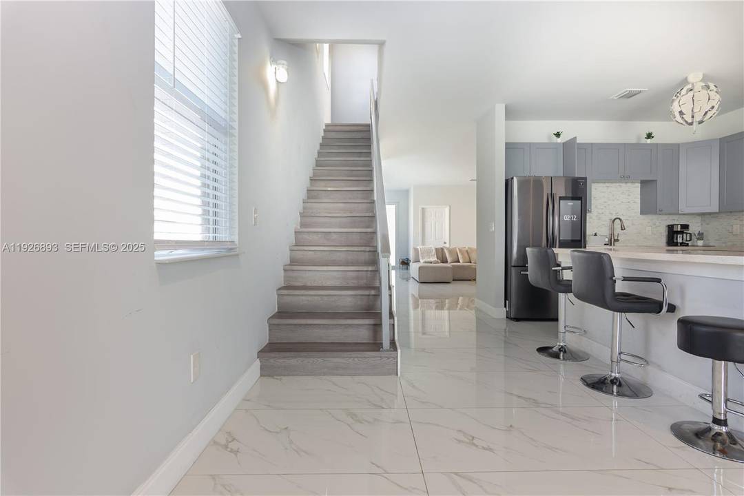 Turn key furnished duplex offering exceptional rental income potential !