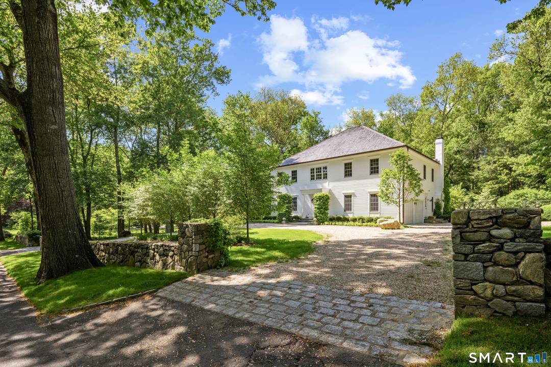 Located in the coveted Greenfield Hill neighborhood, this exceptional property offers the perfect blend of weekend retreat and everyday living, just 60 miles from Manhattan.