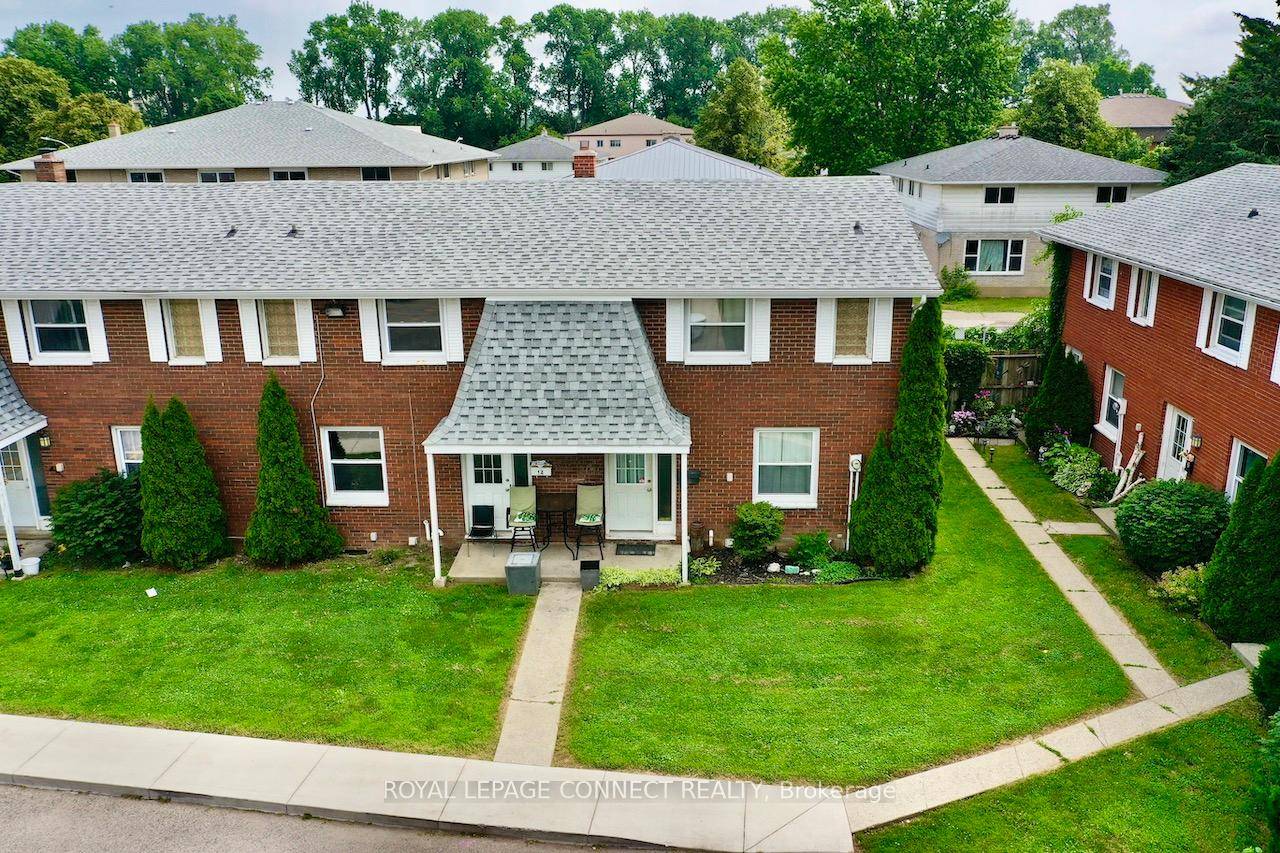 All brick centrally located well established 2 storey, 3 bedroom, 2 washroom condominium townhome with own exclusive parking, and sizeable useable unfinished basement, laundry area, and gas forced air heating.