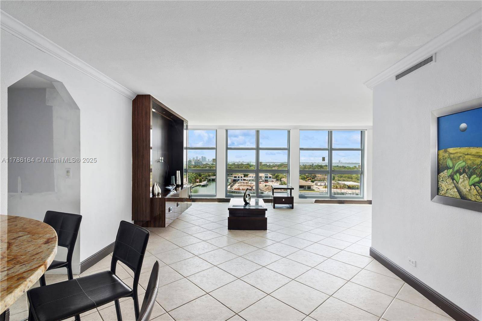 THE BUILDING HAS RECENTLY COMPLETED AN UPGRADE OF HIGH IMPACT FLOOR TO CIELING WINDOWS THAT MAGNIFY THE AMAZING UNINTERRUPTED BAY INTRACOASTAL SKYLINE VIEWS.