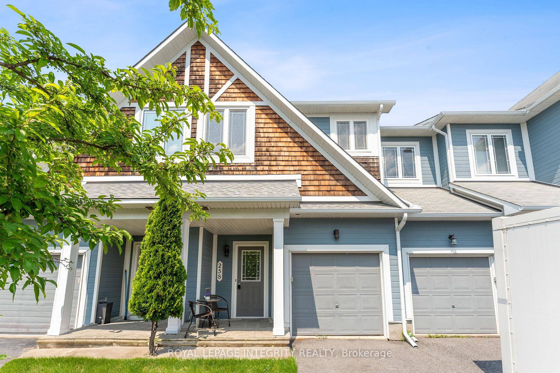 Stunning FREEHOLD NO COMMON FEES Townhome Backing onto Pond amp ; Trails !
