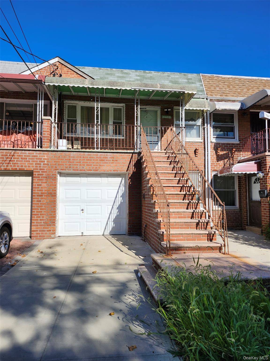 Two Family Brick in the heart of Canarsie, 3 bedrooms, 2 baths with backyard space.