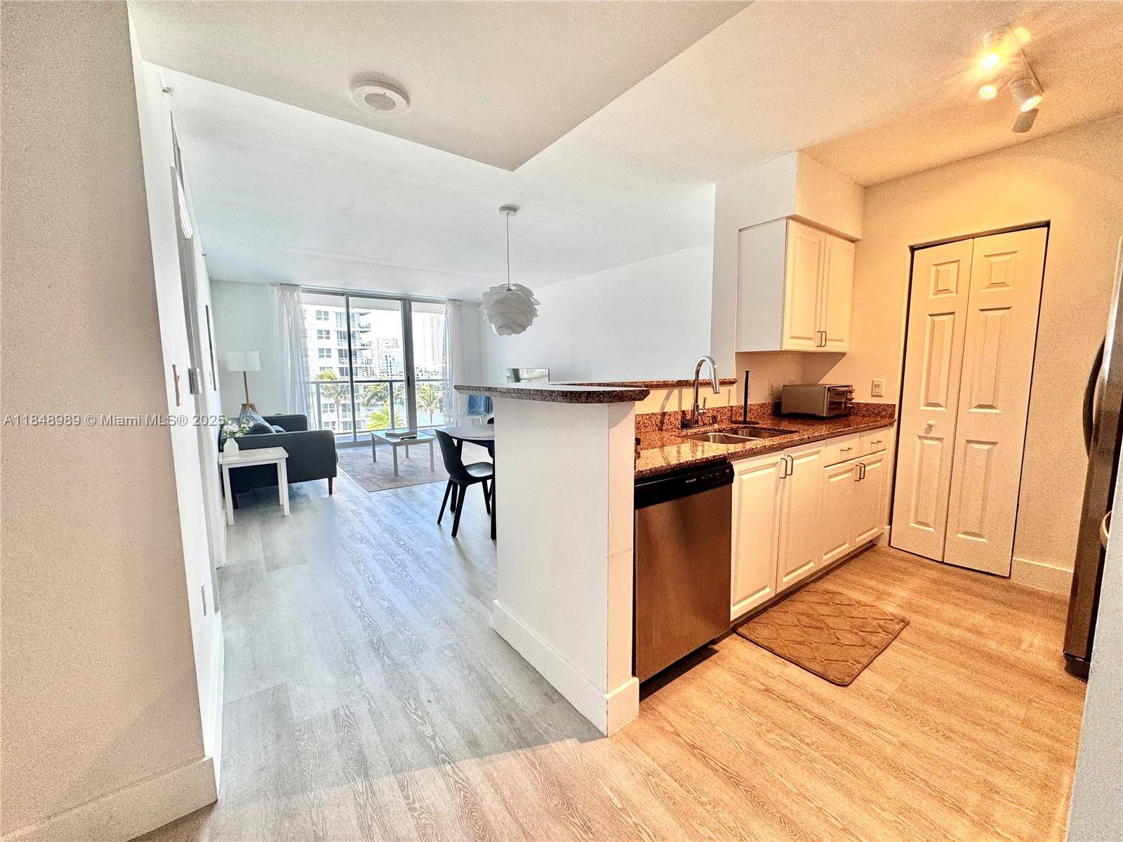 Live the Miami lifestyle in this stunning bayfront condo at The Mark on Brickell !