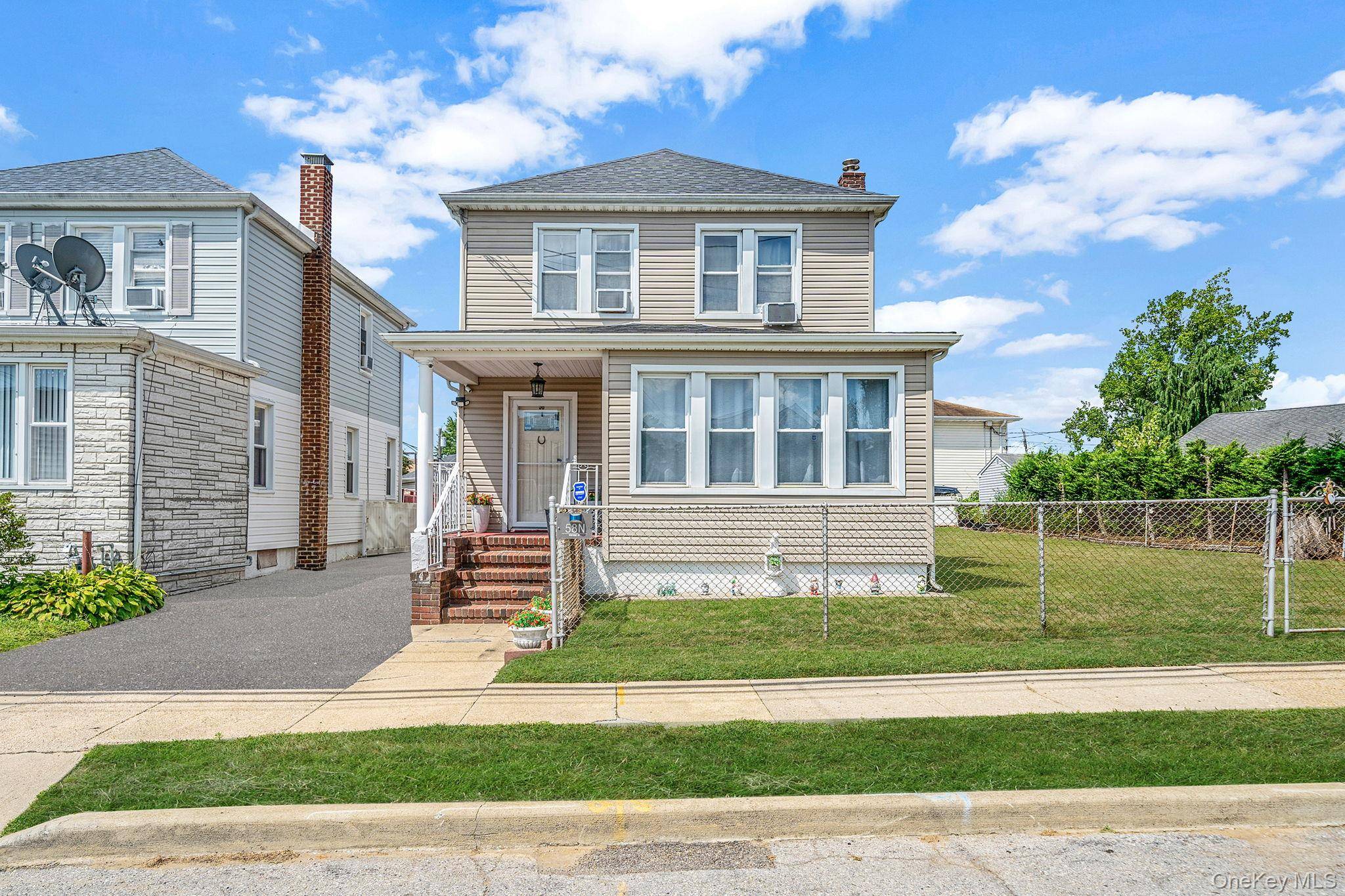 Welcome to an exceptional investment opportunity in the heart of Valley Stream.