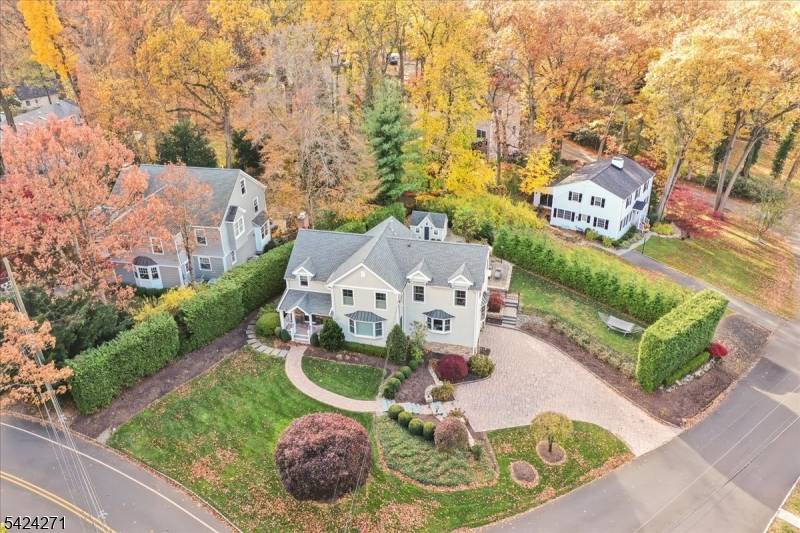 Set in the sought after Tall Oaks section of New Providence, this beautifully updated 4 bed, 3.