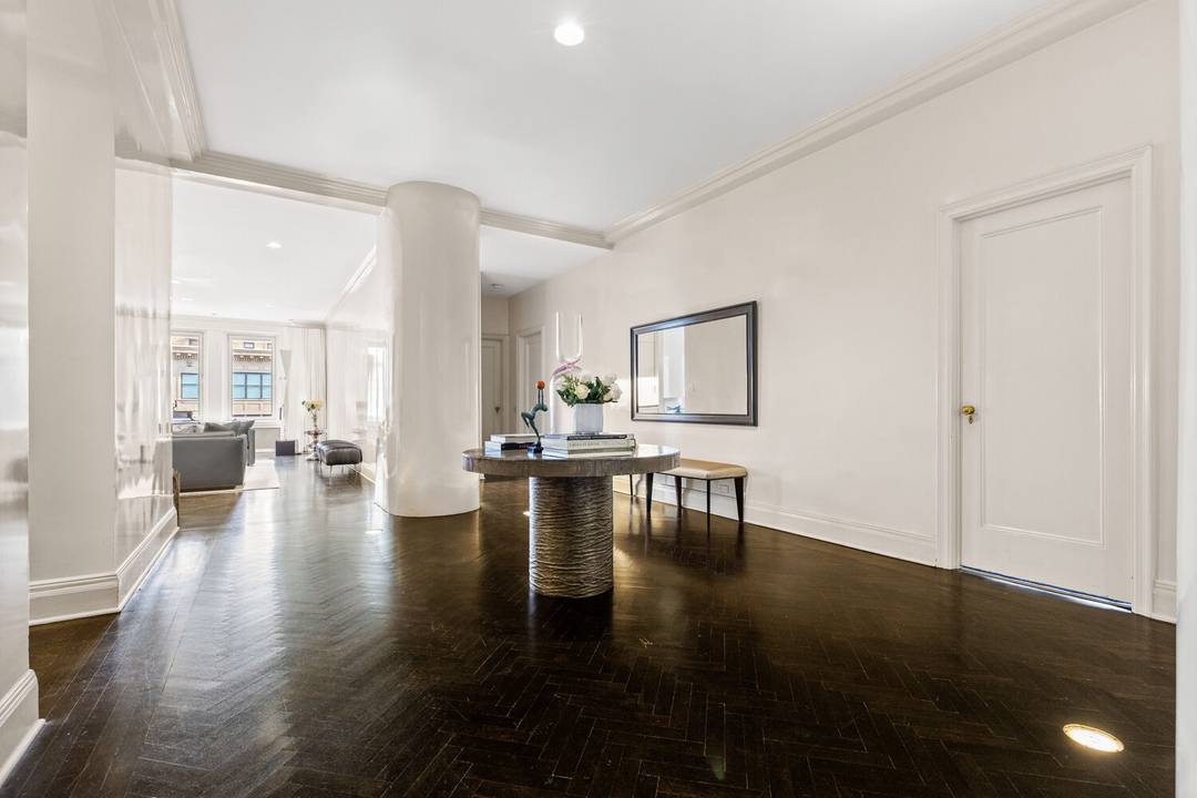 A chic and spacious nine room, loft like prewar apartment on Park Avenue, featuring 10 foot ceilings and timeless elegance throughout.