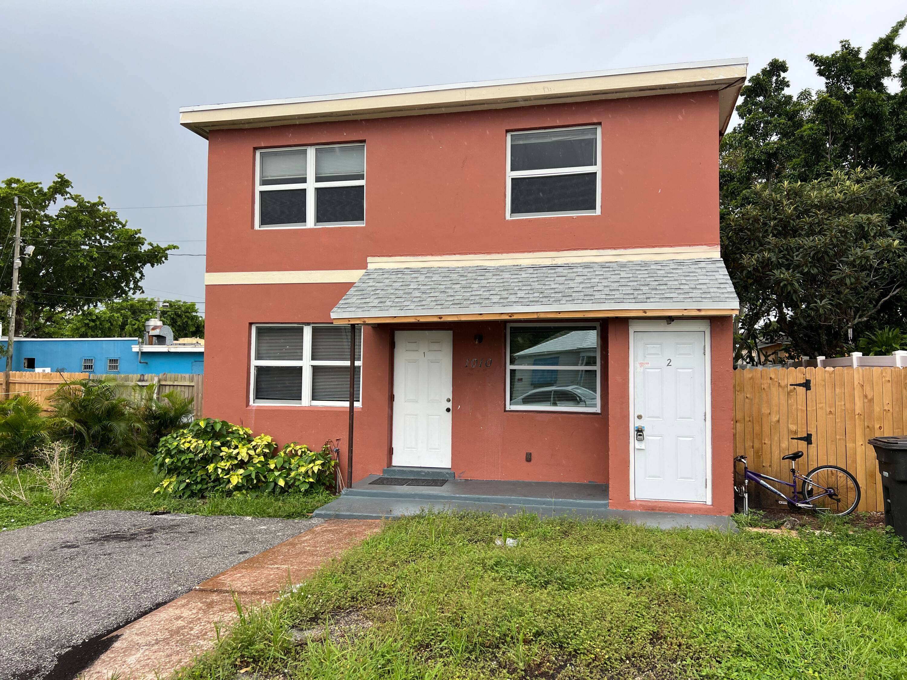 This fully remodeled and updated duplex features brand new roofing and air conditioning, ensuring comfort and reliability.