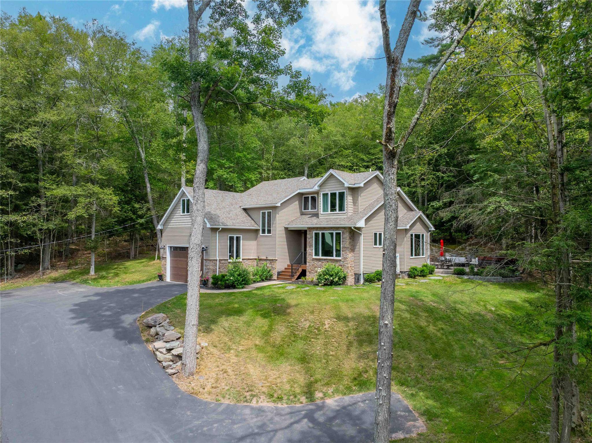 Welcome to 224 Lake Shore Drive, a turn key lakeview retreat set on a peaceful 0.