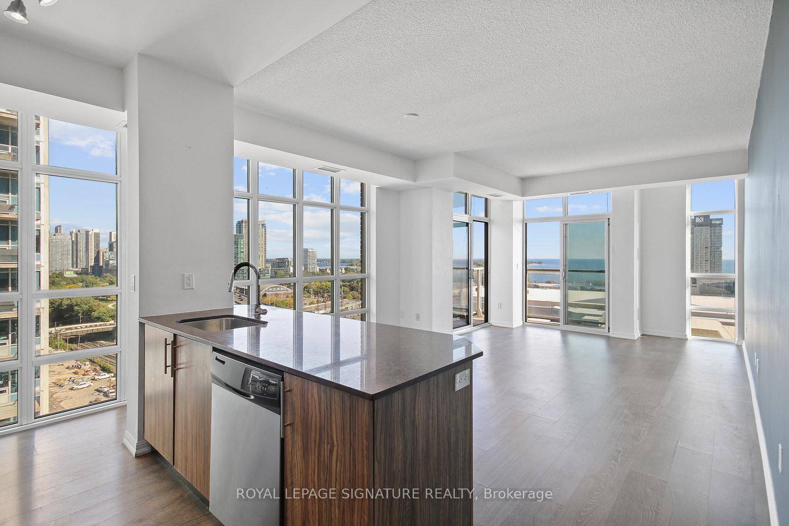 Sun Splashed amp ; All Inclusive 1 Bed 1 Bath Corner Suite with 2 Balconies, Parking amp ; A Locker !