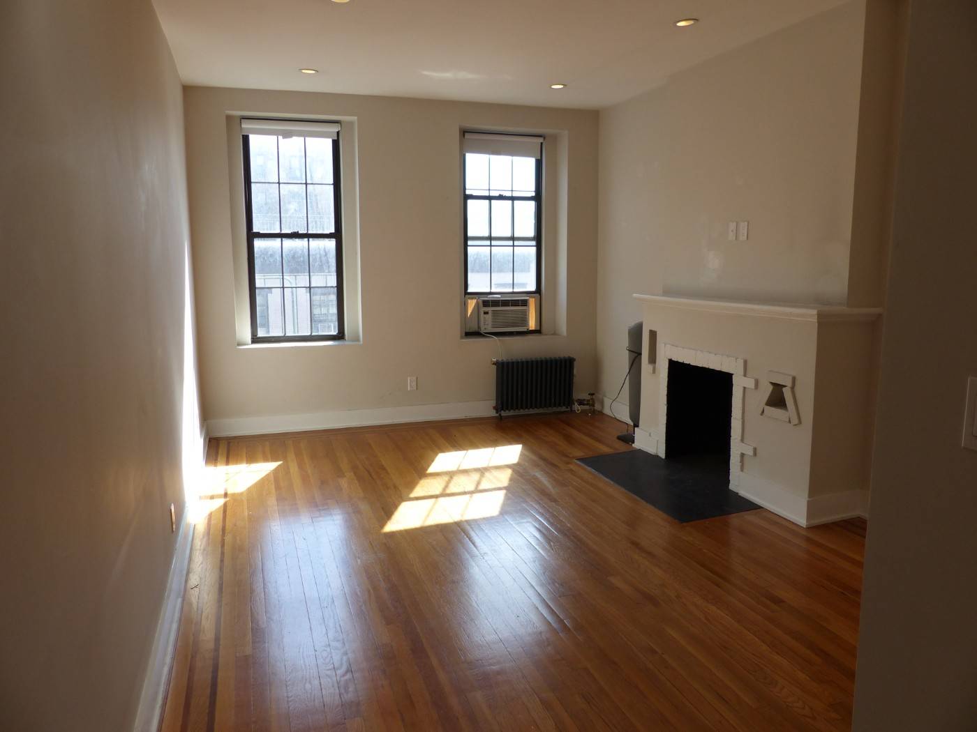 Studio West 8th Street 6th Avenue HUGE, Bright Studio Approx 400SF of living area with huge living room featuring hardwood floors, beautiful fireplace and mantle, 2 gorgeous south facing windows ...