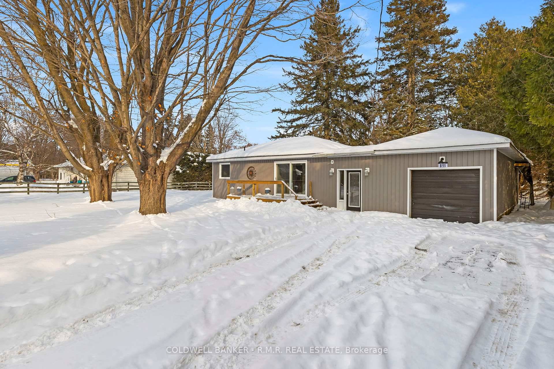 Charming 3 bedroom, 1 bath bungalow nestled on over half an acre of serene, tree covered land in a quiet, family friendly neighborhood.