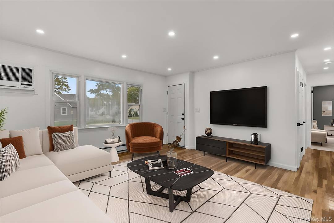 Totally renovated 2 family BY CO house featuring 5 bedrooms and 3 full bathrooms, with a fully finished basement offering outside access.