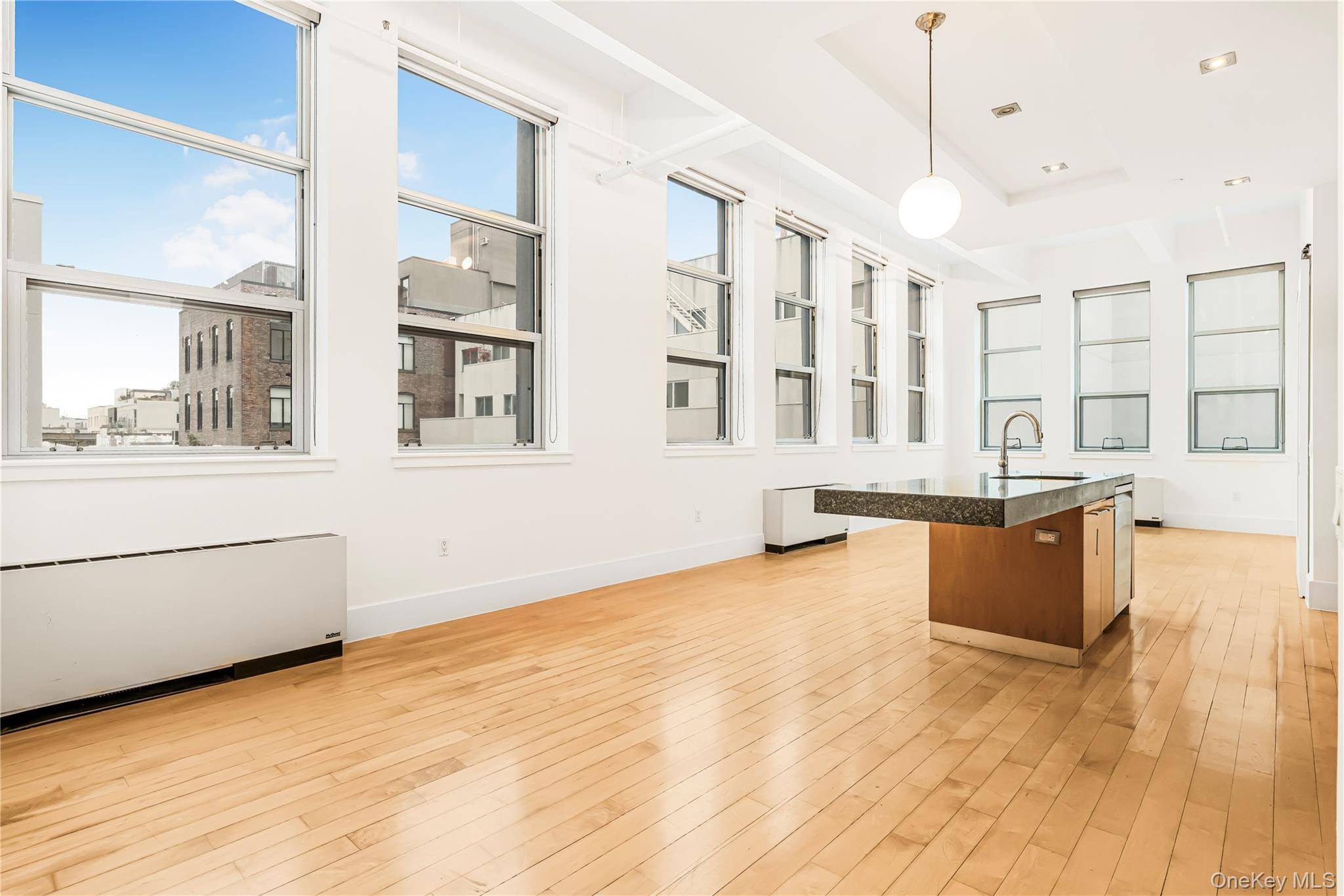 This spacious 1, 357 sq ft 2 bedroom, 2 bathroom loft at 55 Berry Street, Apt 4F in Williamsburg, features soaring 13 foot ceilings, original beams, and oversized windows, offering ...