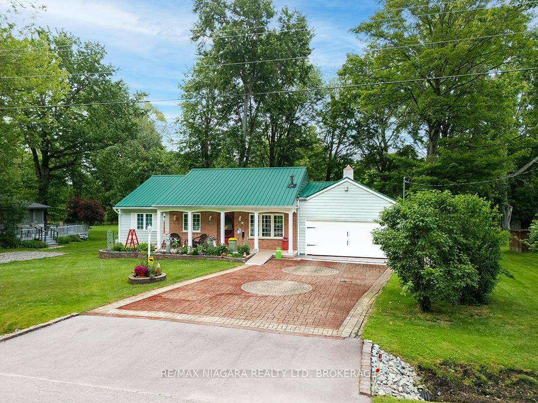 Tucked into a quiet, well established neighbourhood steps from Wyldewood Beach, this beautifully maintained 1, 323 sq.