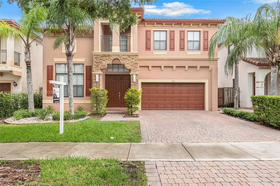 Welcome to this stunning 5 bed, 3 full bath home with BRAND NEW HURRICANE IMPACT WINDOWS and DOORS, located in the highly sought after community of Mallorca at The Vineyards.