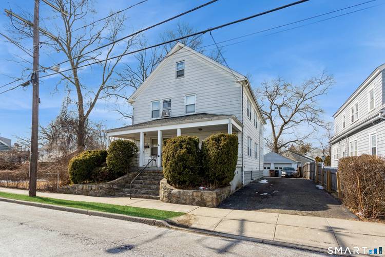 Newly renovated 4 bedroom, 2 bath apartment offering two levels of spacious living on the second and third floors of a two family home.