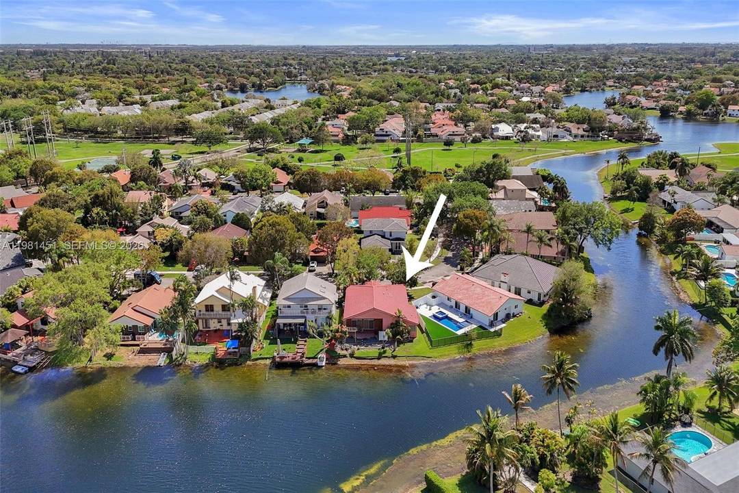 Framed by scenic tree lined streets and lakes, this charming three bedroom two bath waterfront residence offers a rare opportunity to create your dream home in the sought after community ...
